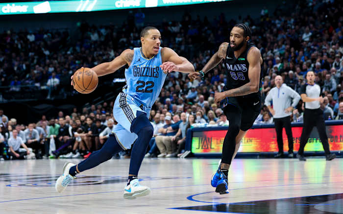 Dec 1, 2023; Dallas, Texas, USA; Memphis Grizzlies guard Desmond Bane (22) drives to the basket as Dallas Mavericks forward Derrick Jones Jr. (55) defends during the second half at American Airlines Center. Mandatory Credit: Kevin Jairaj-USA TODAY Sports